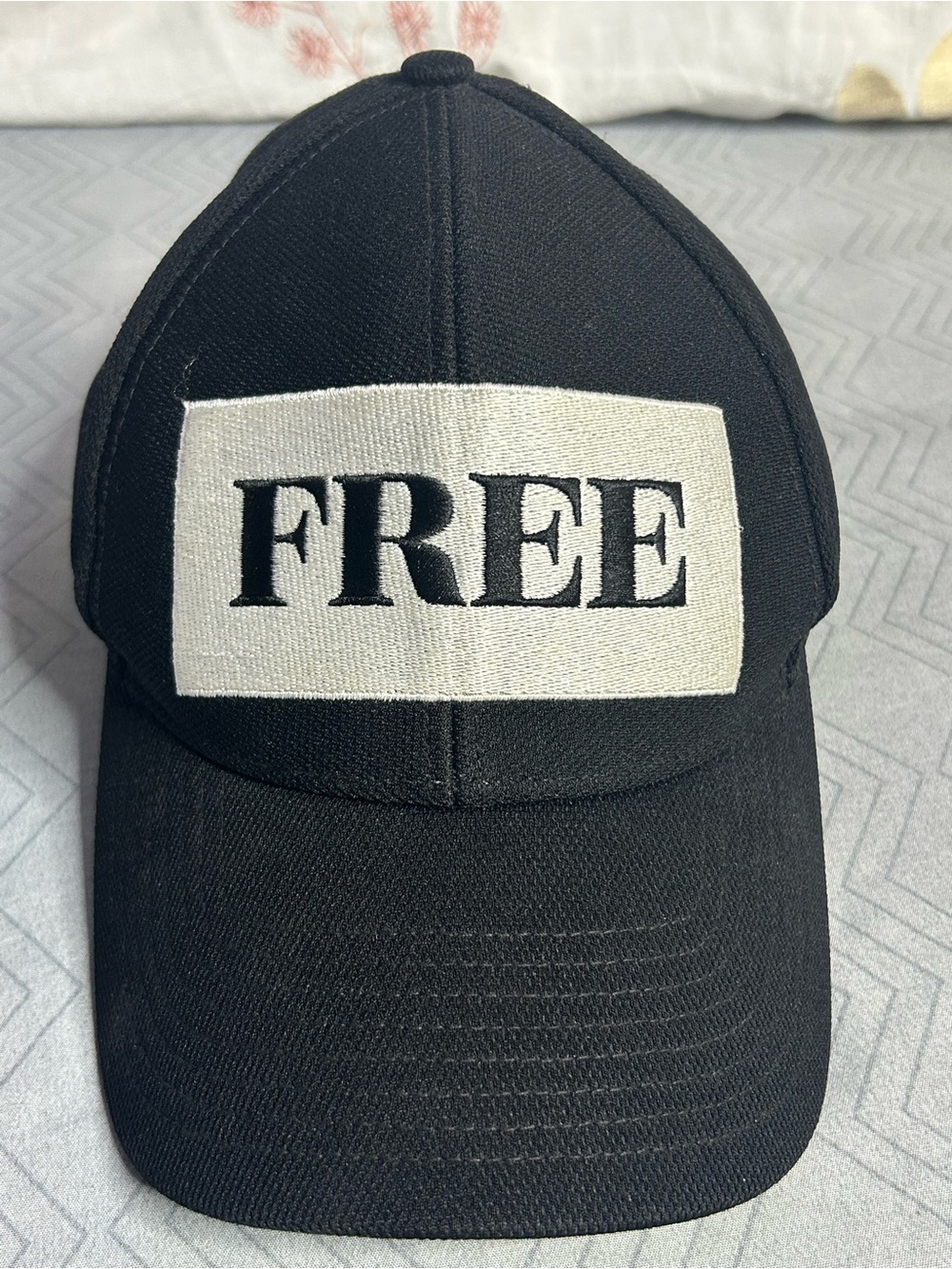 Wilfred Free “FREE” Black Structured Baseball Cap Adjustable